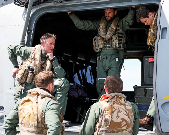 Commander Ian Varley, CO of 820 NAS, talks to the aircrew. Picture: LPhot Luke