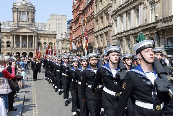 Sailors parade through the centre of Liverpool during Battle of the Atlantic 80th anniversary commemorations