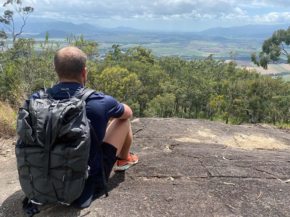 Sailor enjoys the view from Walshs Pyramid a 3000ft height near Cairns