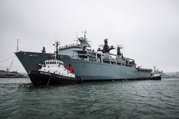 HMS Albion sails into Her Majesty's Naval Base in Devonport