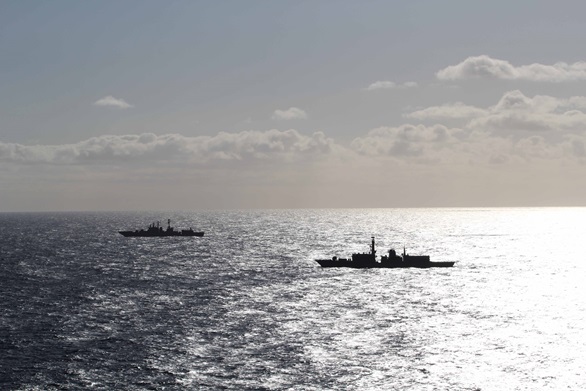 HMS Northumberland escorts a Russian destroyer